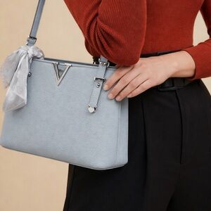 Chic Light Blue Tote Bag with Accessories